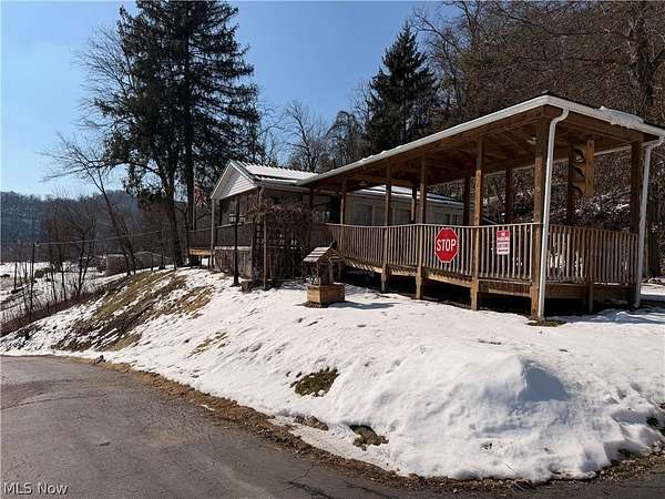 1.58 Acres of Residential Land with Home for Sale in Rayland, Ohio