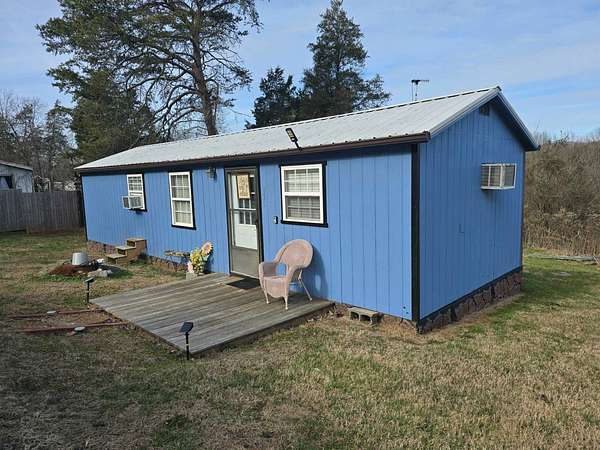 11.2 Acres of Land with Home for Sale in Kodak, Tennessee