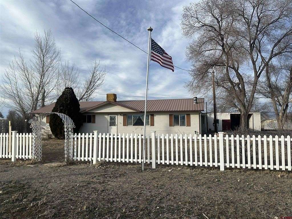 1.5 Acres of Residential Land with Home for Sale in Olathe, Colorado