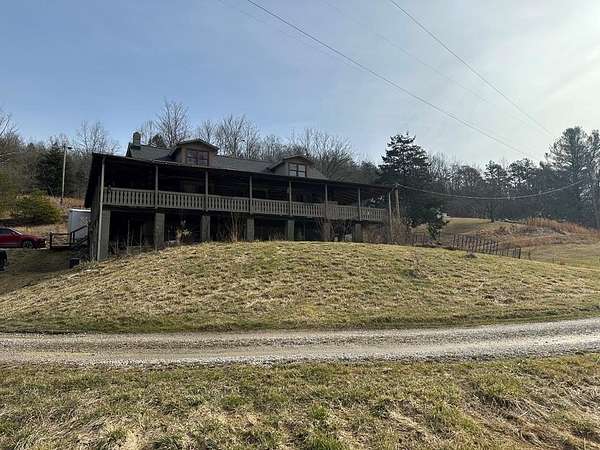 13.2 Acres of Land with Home for Sale in Jackson, Kentucky