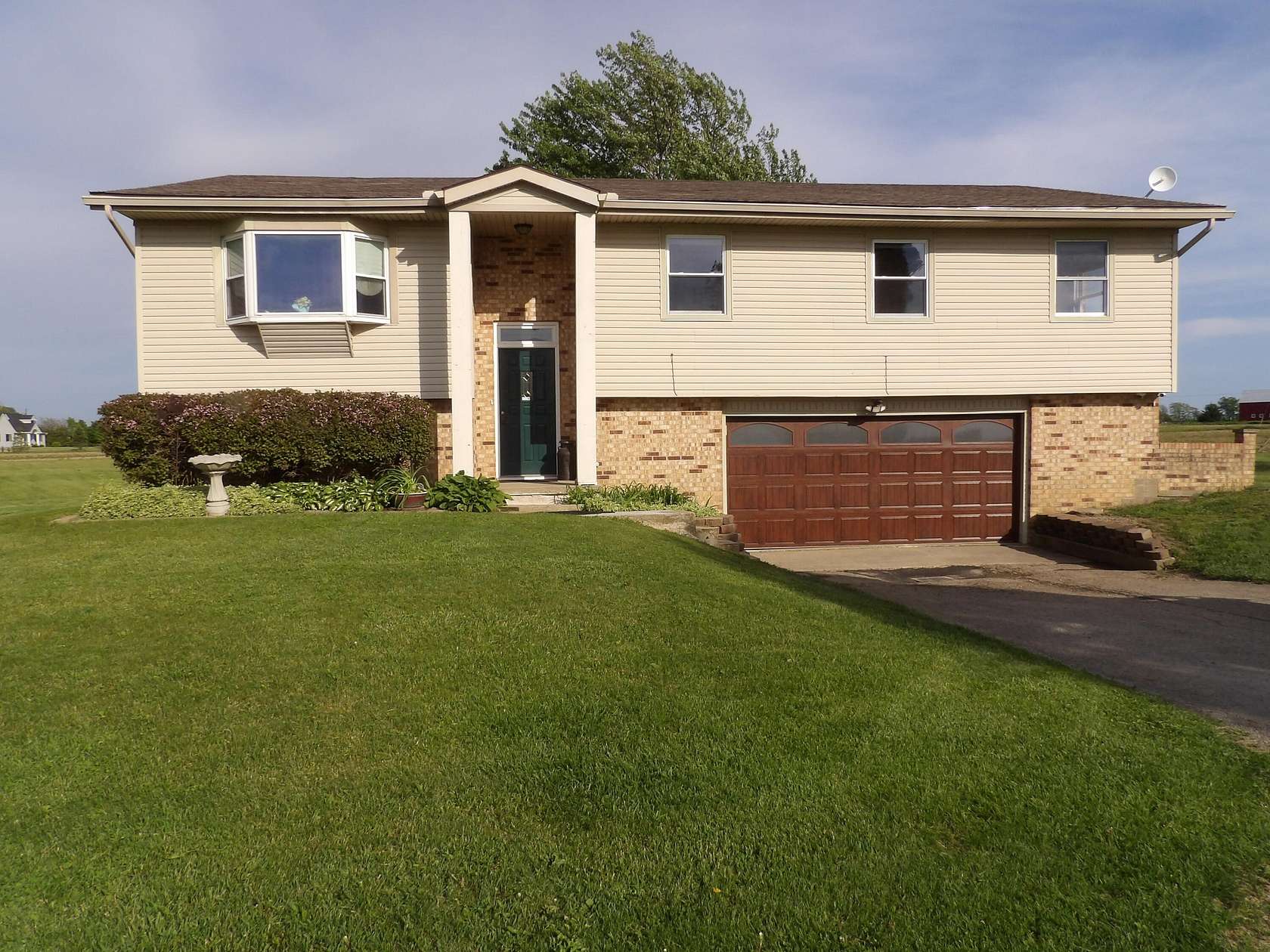 5.56 Acres of Land with Home for Sale in Casstown, Ohio