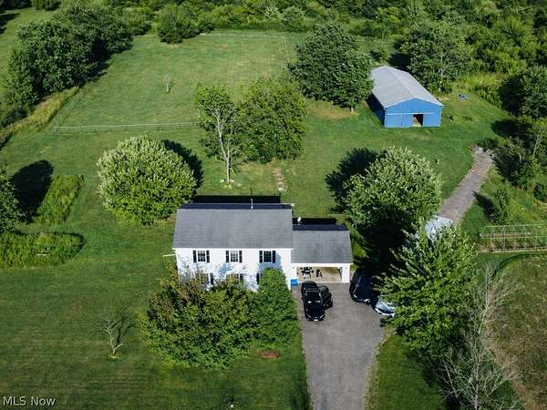 5 Acres of Land with Home for Sale in Thompson, Ohio