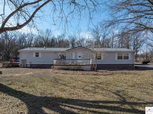 4.4 Acres of Residential Land with Home for Sale in Houstonia, Missouri