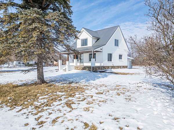 6 Acres of Land with Home for Sale in Coleman, Michigan