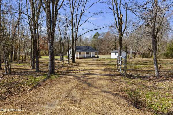 7.3 Acres of Residential Land with Home for Sale in Terry, Mississippi