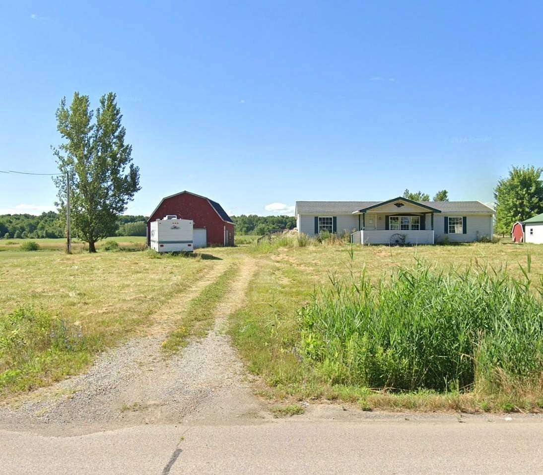 1.72 Acres of Residential Land with Home for Auction in Sullivan, Ohio