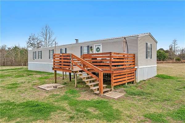 3 Acres of Land with Home for Sale in Grand Bay, Alabama