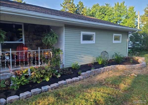 5 Acres of Residential Land with Home for Sale in Richland, Missouri