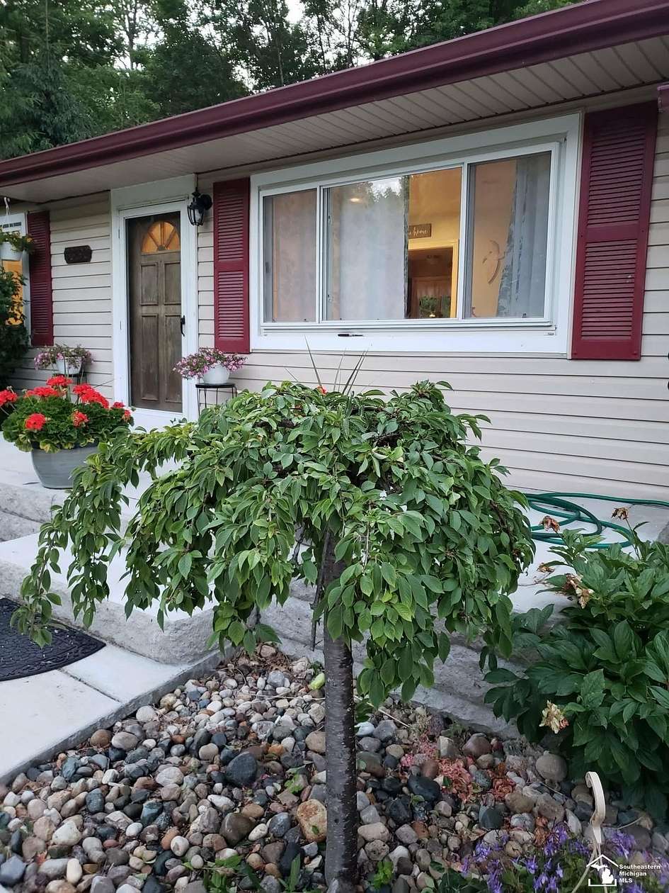 0.68 Acres of Residential Land with Home for Sale in New Boston, Michigan