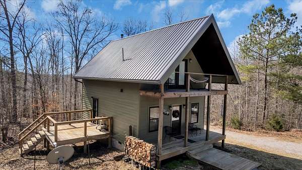 26.9 Acres of Recreational Land with Home for Sale in Sparta, Tennessee