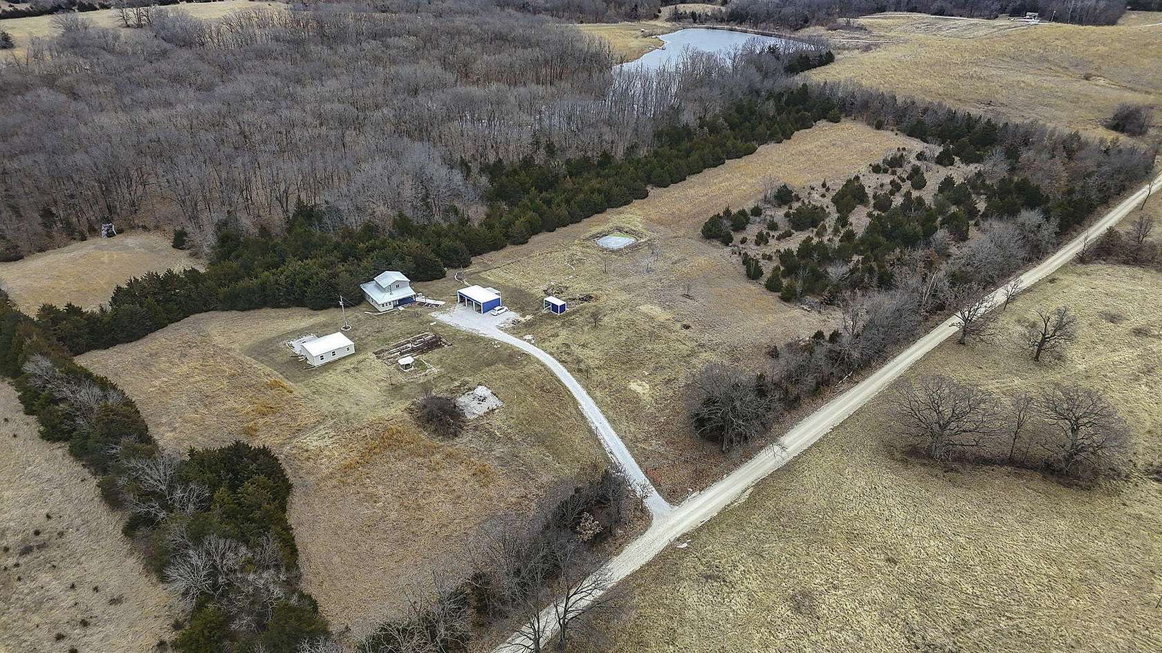 10.8 Acres of Land with Home for Sale in Higbee, Missouri