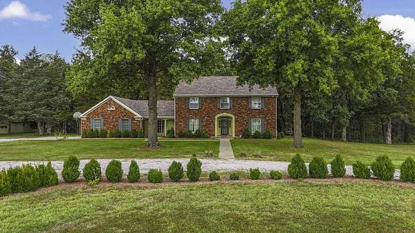 10 Acres of Residential Land with Home for Sale in Paris, Missouri