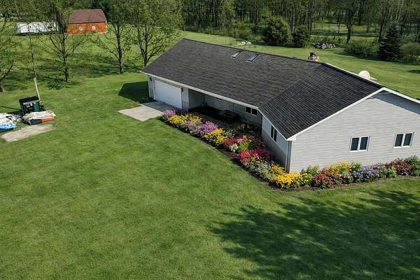 3 Acres of Residential Land with Home for Sale in Birch Run, Michigan