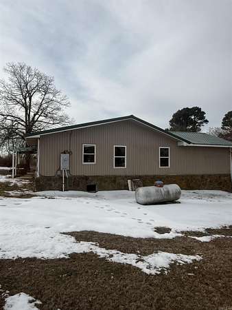 2 Acres of Residential Land with Home for Sale in Prim, Arkansas