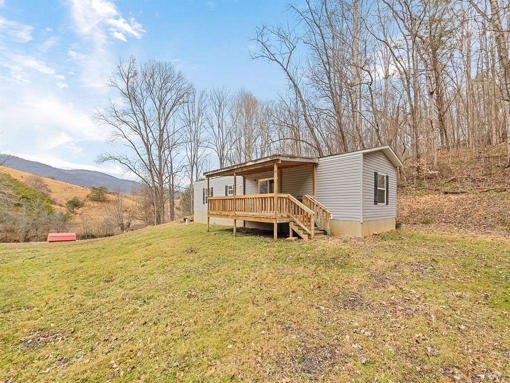 6.42 Acres of Land with Home for Sale in Waynesville, North Carolina