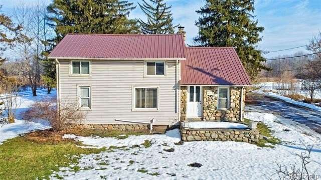 2.5 Acres of Residential Land with Home for Sale in Ortonville, Michigan