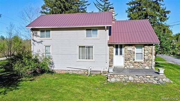 2.5 Acres of Land with Home for Sale in Ortonville, Michigan