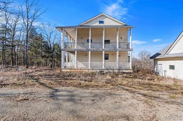 23.4 Acres of Recreational Land with Home for Sale in Farmington, Missouri