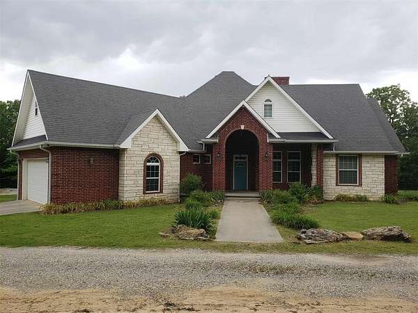 95 Acres of Recreational Land with Home for Sale in Holdenville, Oklahoma