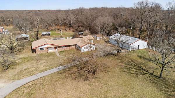 29.7 Acres of Agricultural Land with Home for Sale in Neosho, Missouri