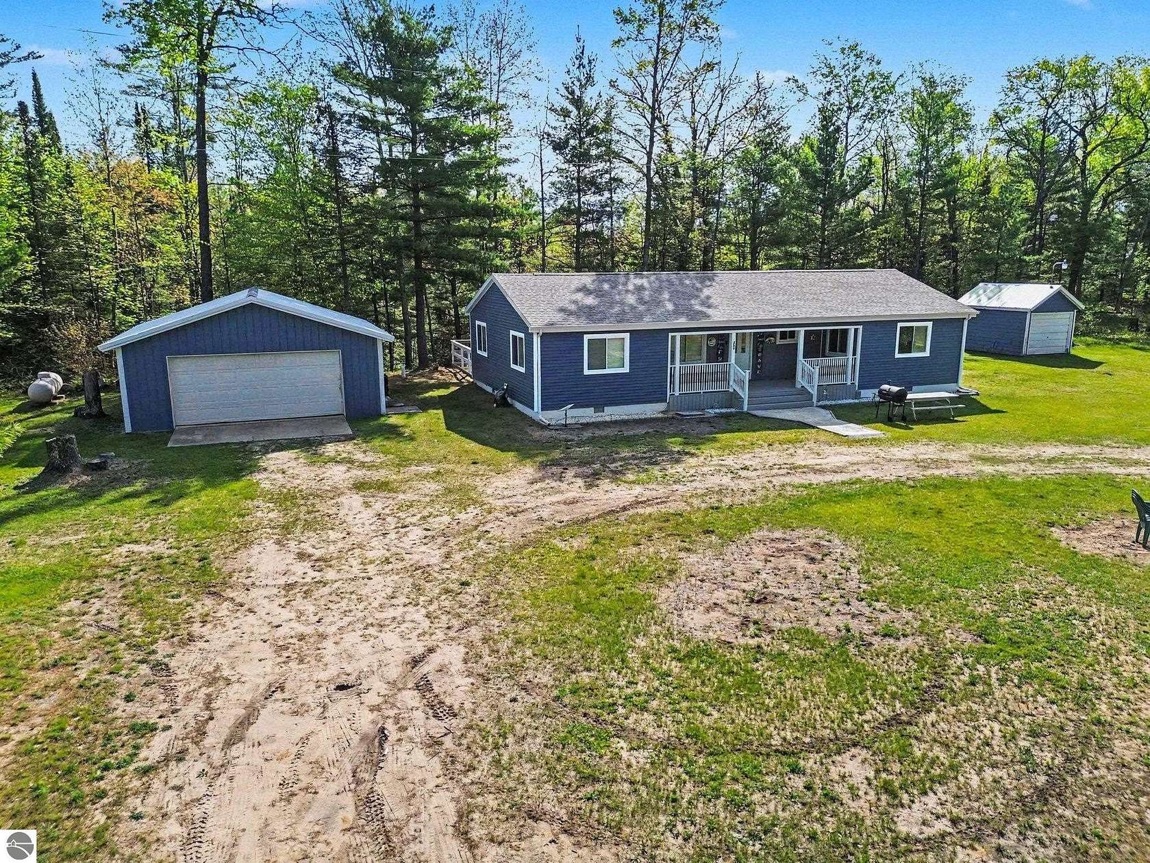4 Acres of Land with Home for Sale in Harrison, Michigan
