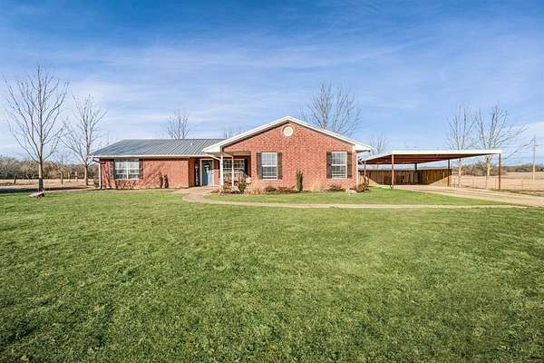 69.6 Acres of Land with Home for Sale in Brookston, Texas