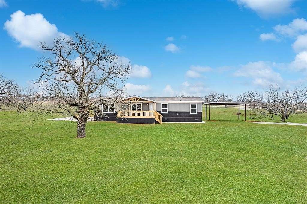 2 Acres of Residential Land with Home for Sale in Poolville, Texas