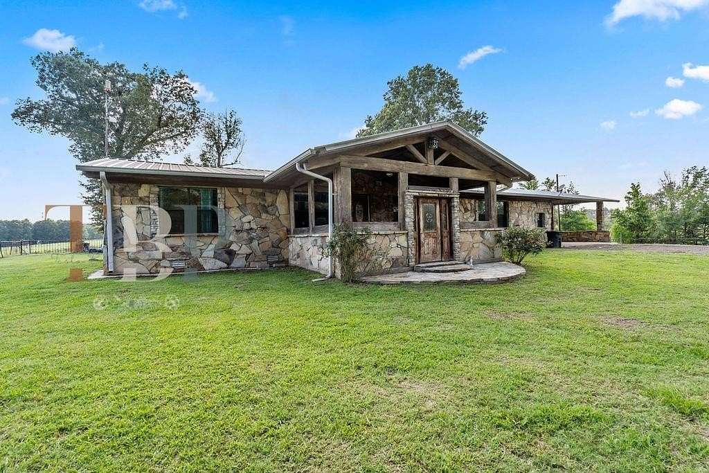 31.2 Acres of Agricultural Land with Home for Sale in Hughes Springs, Texas