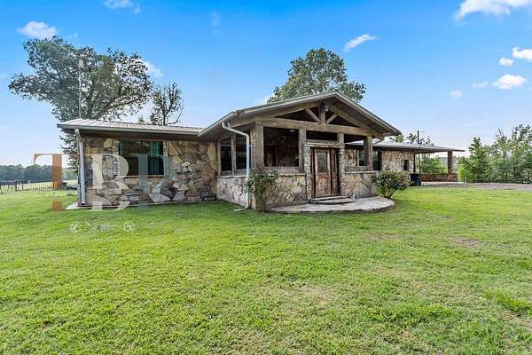 31.2 Acres of Agricultural Land with Home for Sale in Hughes Springs, Texas