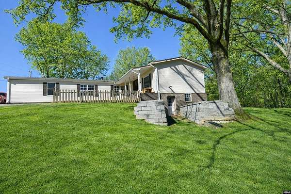 11 Acres of Land with Home for Sale in Sharon, Tennessee