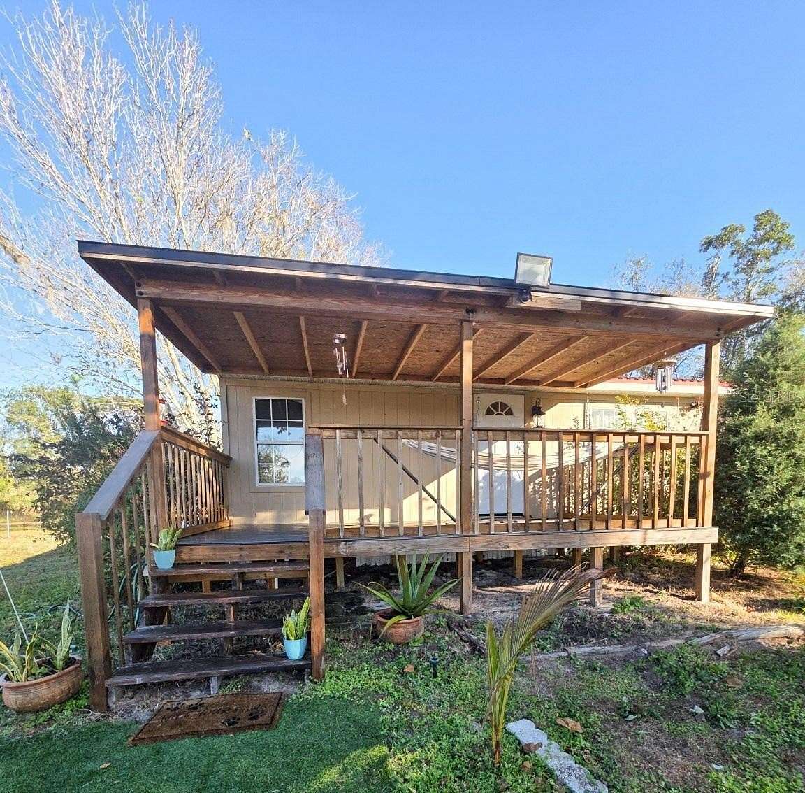 5 Acres of Residential Land with Home for Sale in St. Cloud, Florida