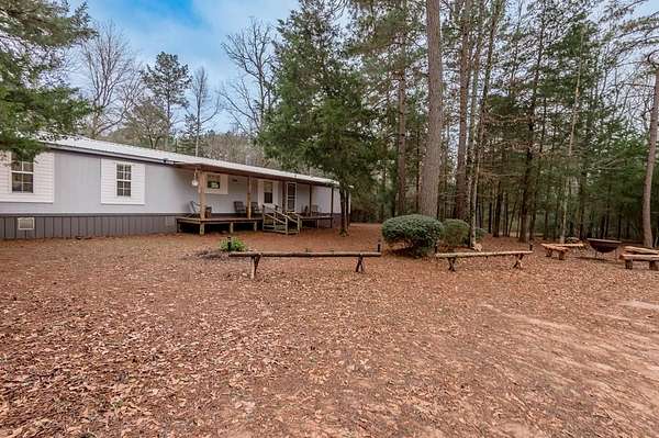 7.67 Acres of Land with Home for Sale in Nacogdoches, Texas