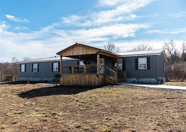 8 Acres of Land with Home for Sale in Falcon, Missouri