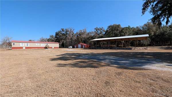 5 Acres of Residential Land with Home for Sale in Floral City, Florida