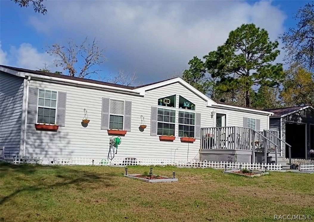 2.52 Acres of Land with Home for Sale in Dunnellon, Florida