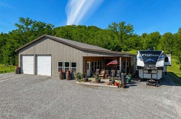 45.7 Acres of Land with Home for Sale in Hartsville, Tennessee