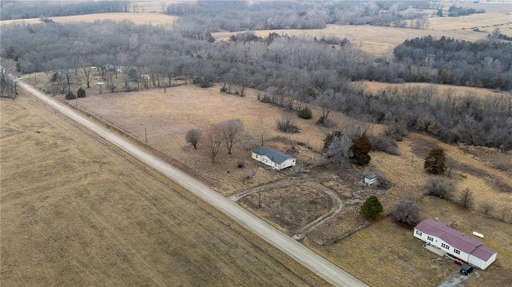8.3 Acres of Residential Land with Home for Sale in Warrensburg, Missouri