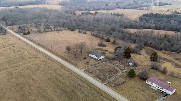 8.3 Acres of Residential Land with Home for Sale in Warrensburg, Missouri