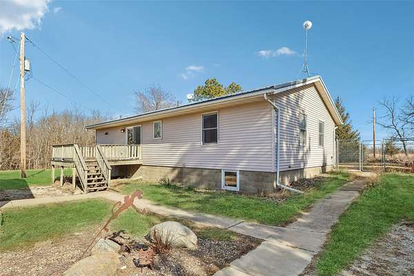 4.25 Acres of Residential Land with Home for Sale in Earlham, Iowa
