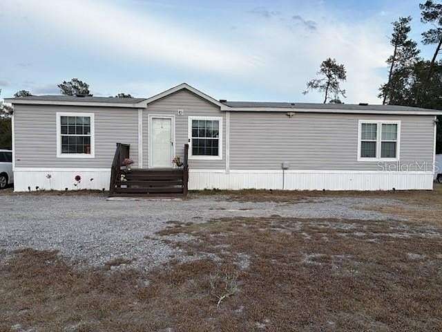 2.46 Acres of Residential Land with Home for Sale in DeLand, Florida