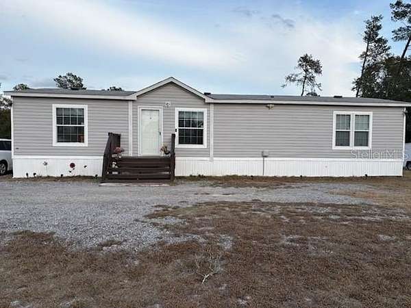 2.46 Acres of Residential Land with Home for Sale in DeLand, Florida