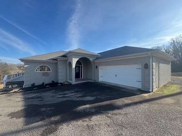 2.57 Acres of Residential Land with Home for Sale in Scottsville, Kentucky