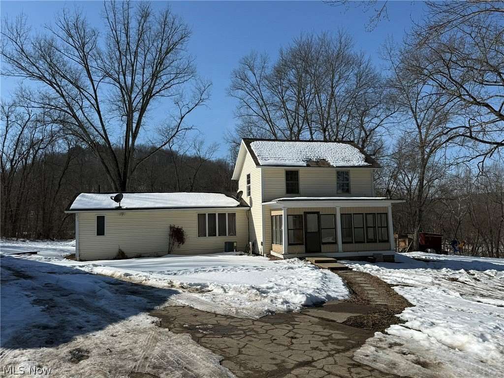 6.6 Acres of Land with Home for Sale in Zoarville, Ohio