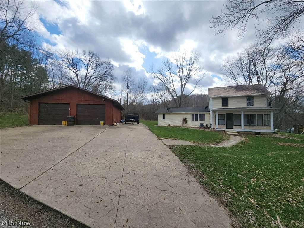 6.6 Acres of Land with Home for Sale in Zoarville, Ohio