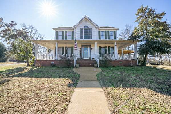 6.5 Acres of Land with Home for Sale in Savannah, Tennessee