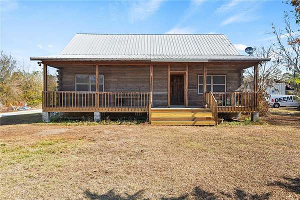 9.72 Acres of Land with Home for Sale in Myakka City, Florida