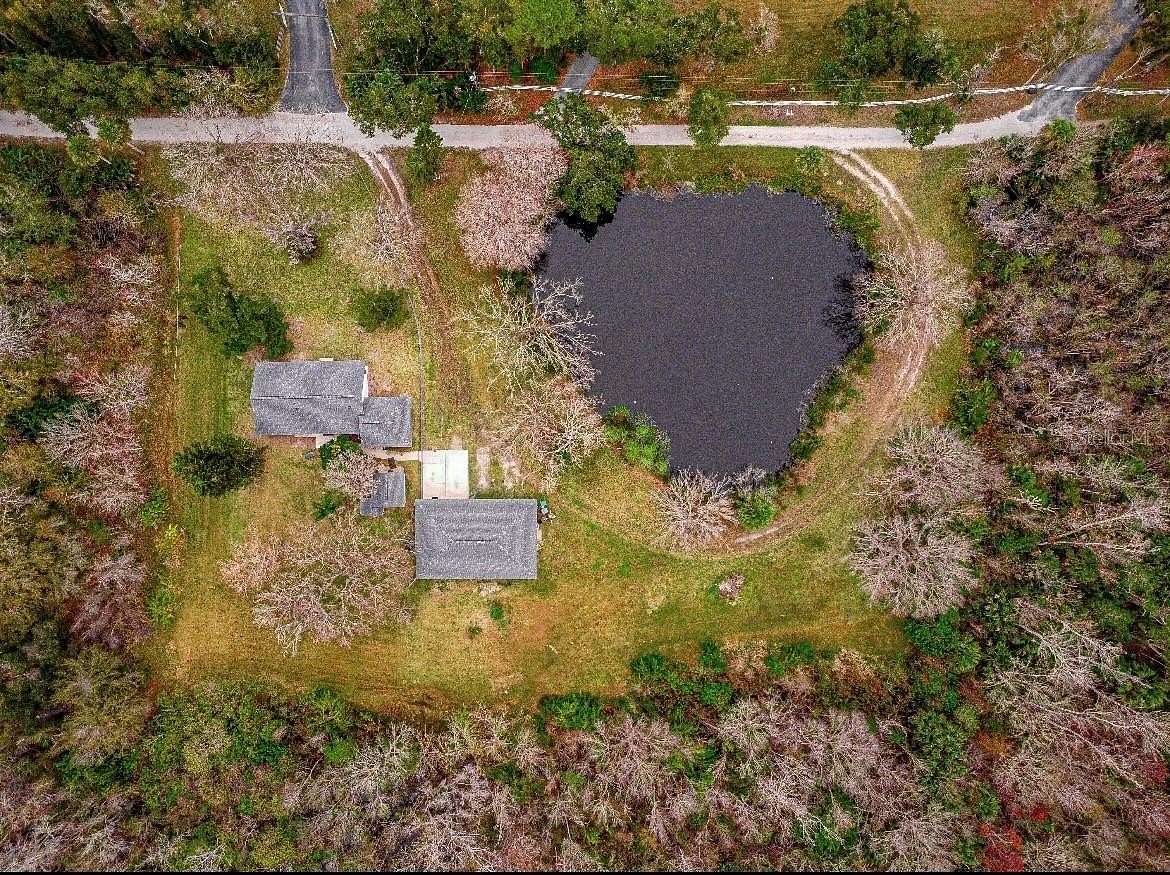 2 Acres of Residential Land with Home for Sale in Edgewater, Florida