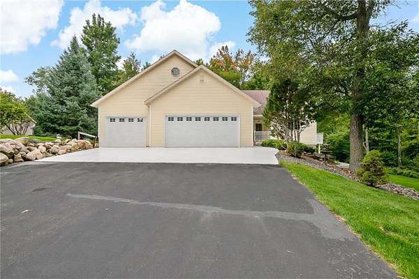 1.69 Acres of Residential Land with Home for Sale in Breezy Point, Minnesota