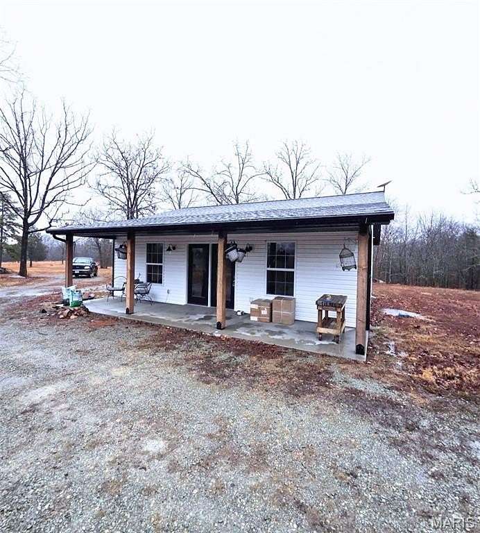 79.4 Acres of Recreational Land with Home for Sale in Farmington, Missouri