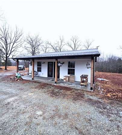 79.4 Acres of Recreational Land with Home for Sale in Farmington, Missouri